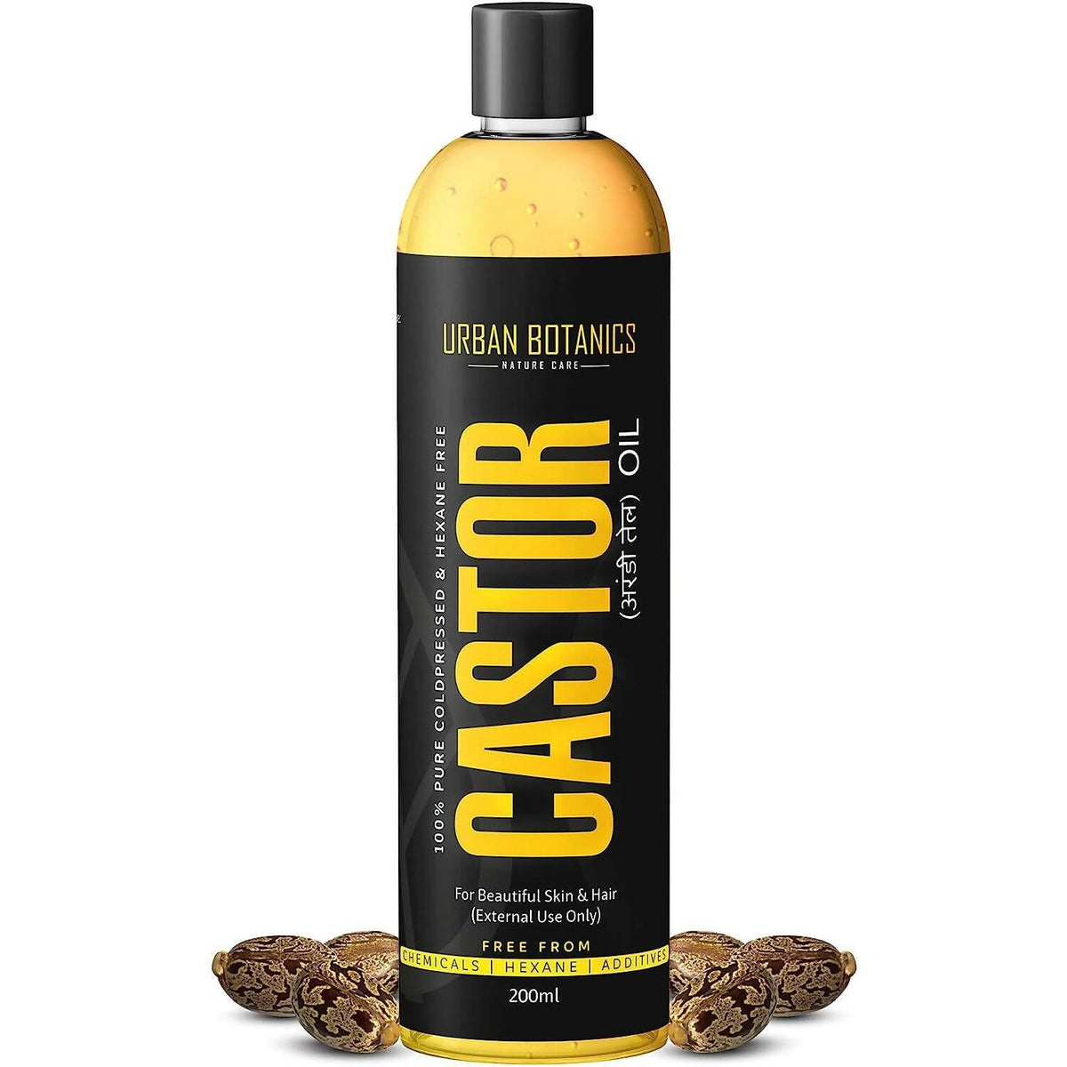 Bottle of Urban Botanics Castor oil with black and yellow label on a white background