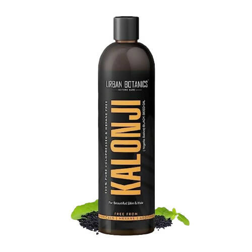 Black bottle of Urban Botanics Kalonji hair product on a white background