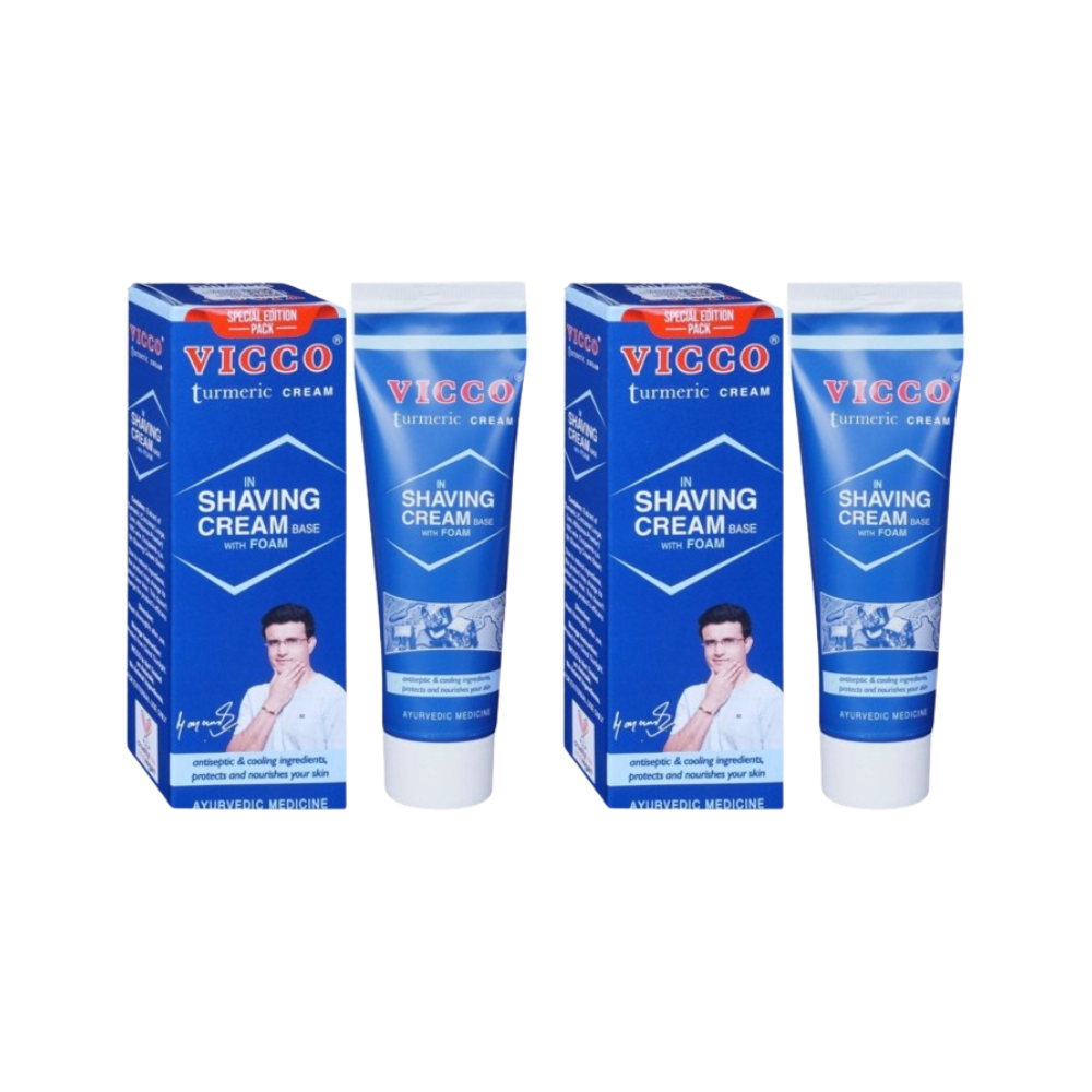 Two boxes and two tubes of Vicco Shaving Cream on a white background