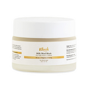 White jar of Milk Mud Mask with gold and black text on a white background