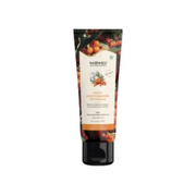 Wellness brand face cleanser tube with natural ingredients on a white background