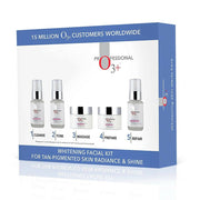 Whitening facial kit packaging with bottles and jars on a white background