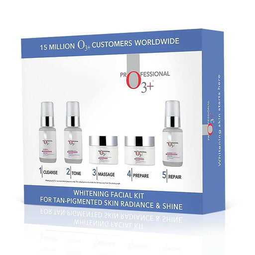 Whitening facial kit packaging with bottles and jars on a white background