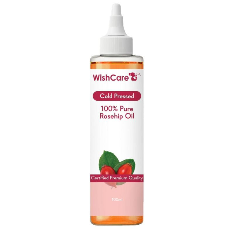 Bottle of WishCare 100% Pure Rosehip Oil on a white background