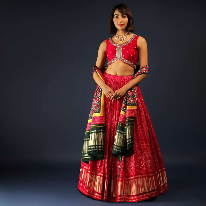 Apple Red Lehenga In Bandhani Printed Satin With Zardosi Embroidered Choli And Patola Dupatta