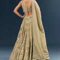 Cream Banarasi Silk Bridesmaid Lehenga With Heavy Hand Embroidery