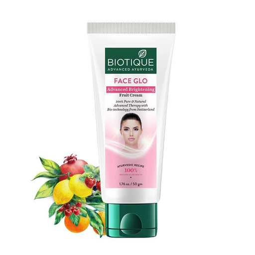 A tube of Biotique Bio White Advanced Fairness Treatment with a picture of a woman indicating the use on the face and a selection of fruits depicted around the image.