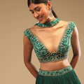 Emerald Green Lehenga In Georgette With A Plunging Neck Crop Top Featuring Floral Hand Work And Choker Dupatta