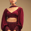 Maroon Lehenga In Crepe With Embroidery Detailing On The Waist And Bishop Sleeved Crop Top