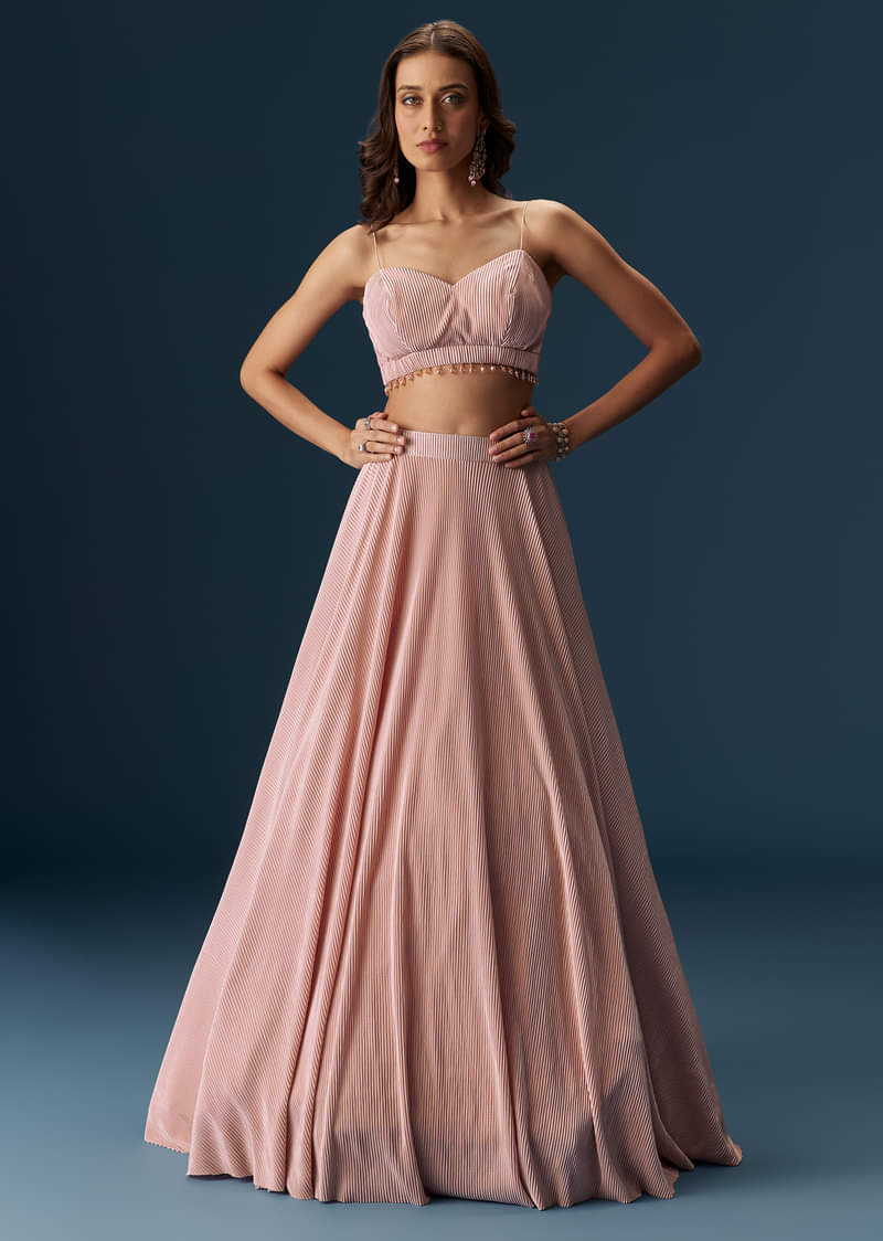 Peach Lehenga With Embroidered Blouse And Coordinating Cape