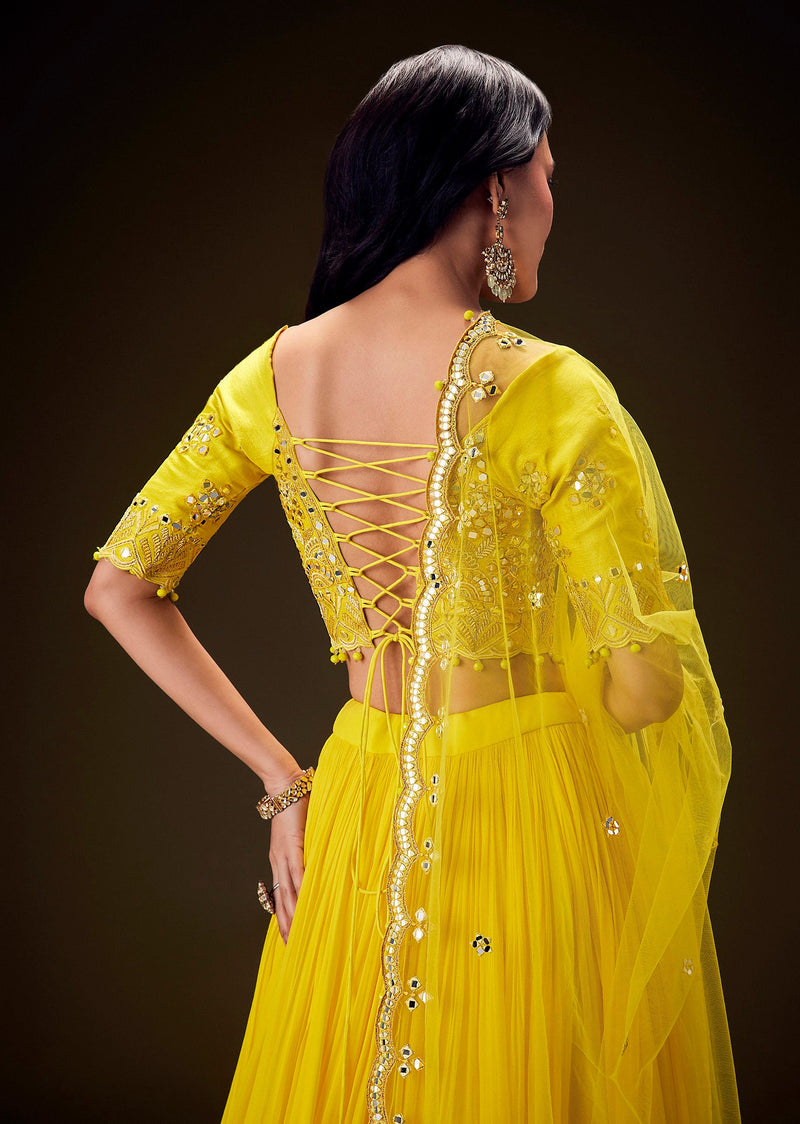 Radiant Yellow Georgette Lehenga With Mirror Work Blouse And Dupatta