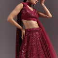 Red Lehenga Set With Embellished Dupatta And Tassels