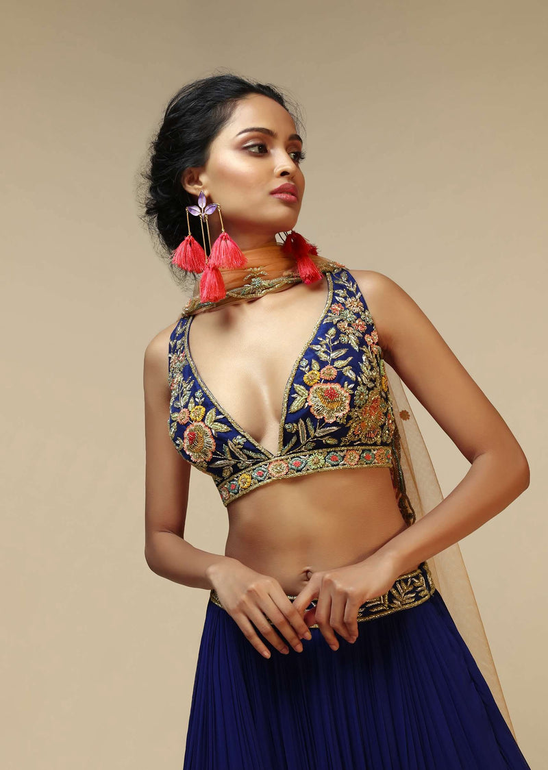 Royal Blue Lehenga Choli With Plunging Neckline And Hand Embroidered Using Multi Colored Beads And Resham