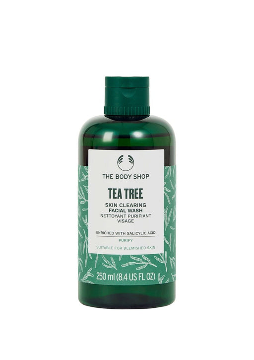 The Body Shop Tea Tree Skin Clearing Facial Wash in a green bottle with white and black labeling, containing 250 ml of product.