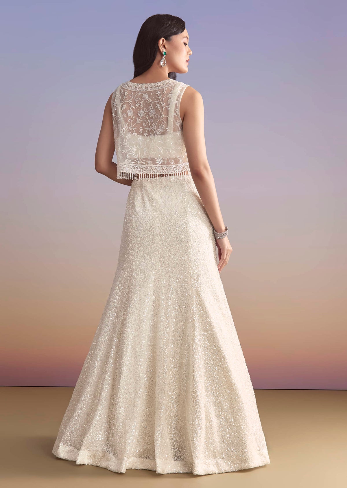 White Net Bridesmaid Lehenga With Sequins Work And Embellished Jacket